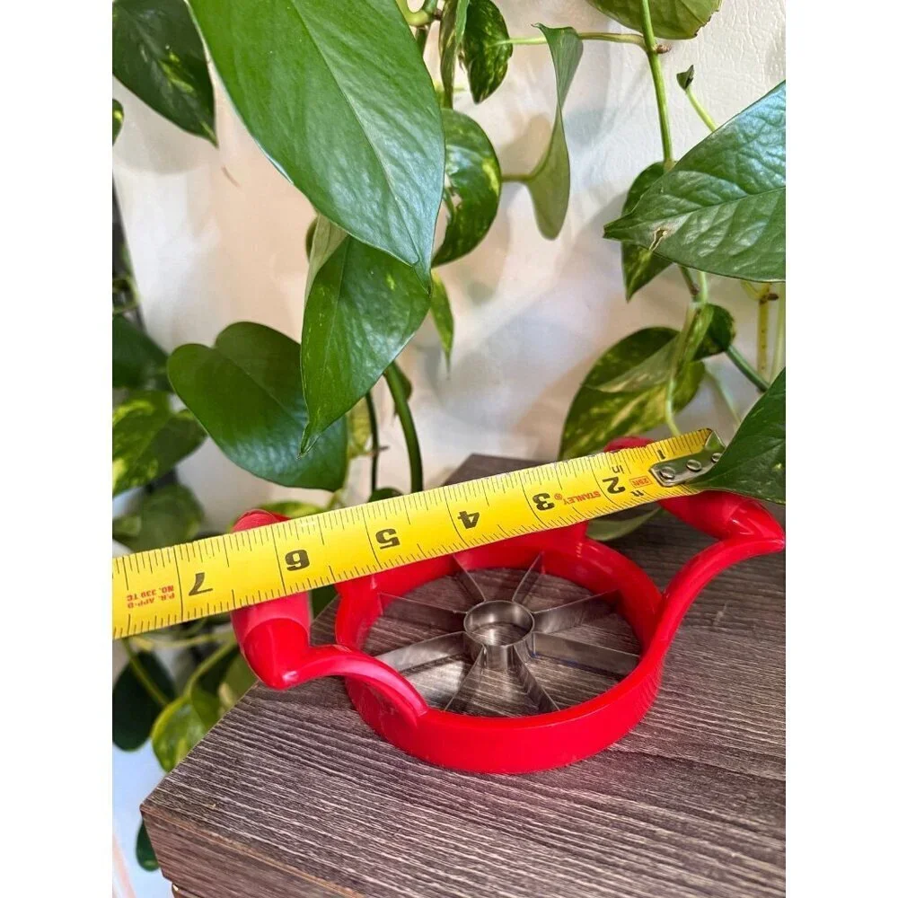 Red apple cutter kitchen accessory